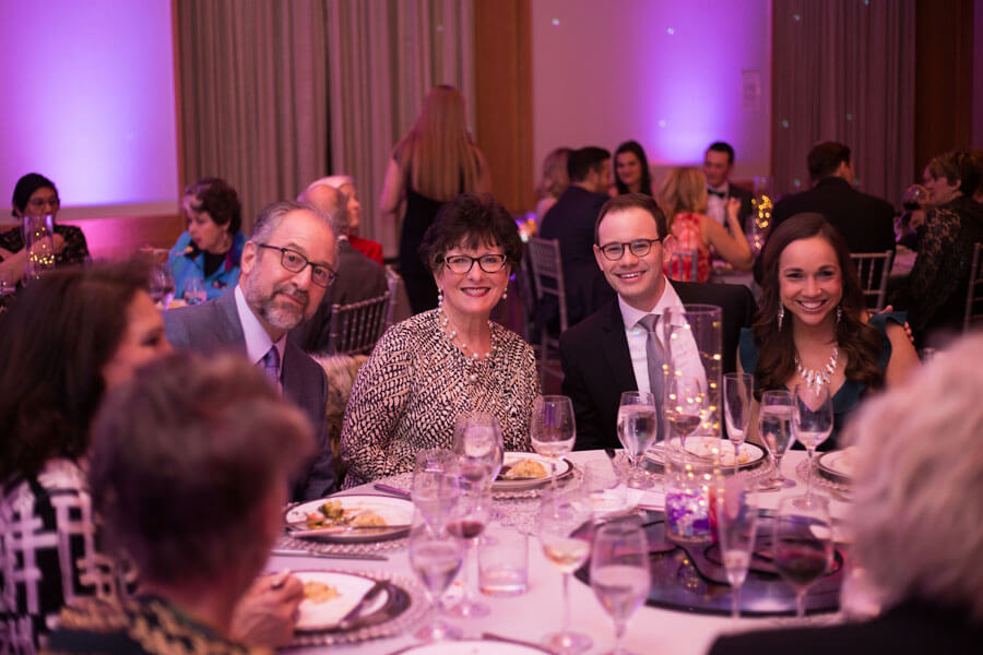 Tulsa Opera sponsors smiling at table